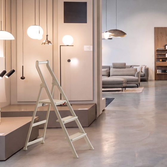 White SHOPLADDER step ladder in a lighting showroom
